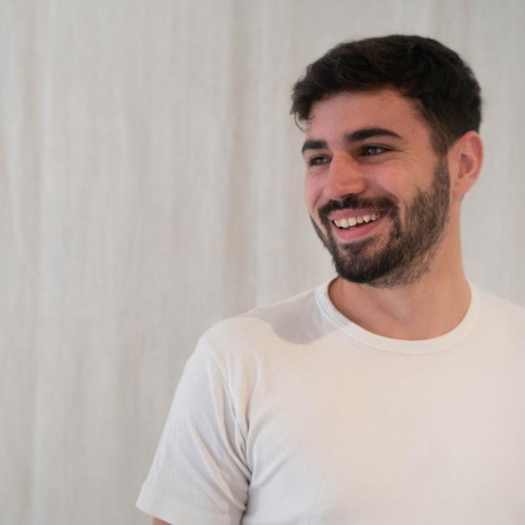 Riley Shah, Client Relations Director, discussing corporate gifting strategy with business clients